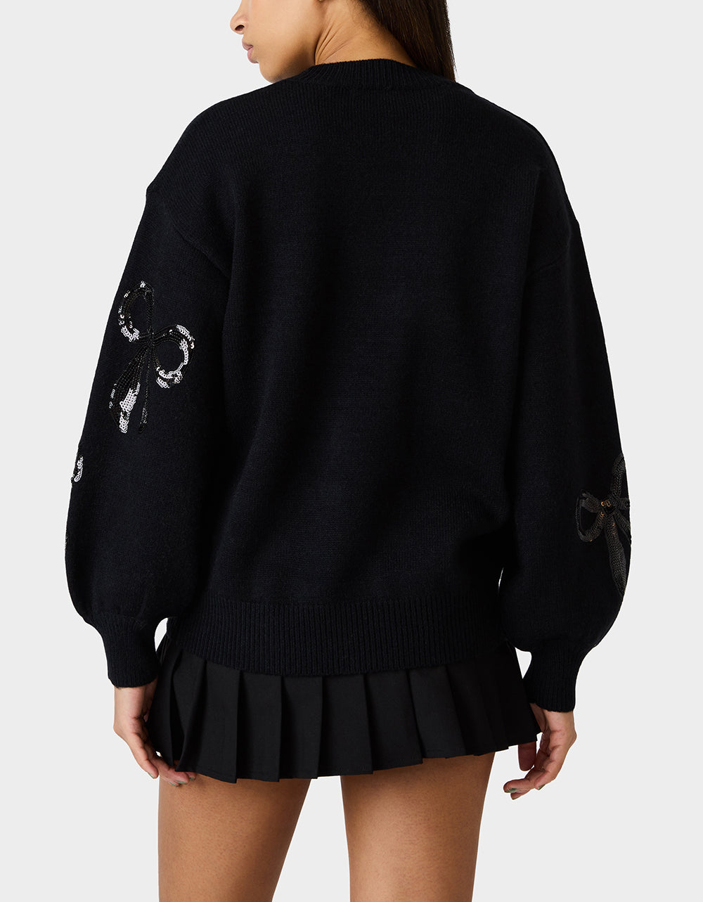 SEQUIN BOW SWEATER BLACK Women's Bow Print Black Cozy Sweater | Betsey Johnson Signature