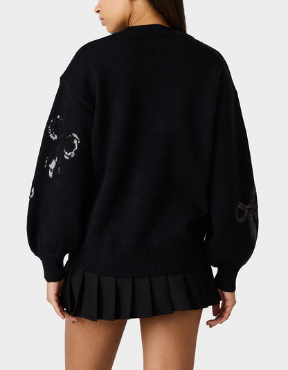 SEQUIN BOW SWEATER BLACK Women's Bow Print Black Cozy Sweater | Betsey Johnson Signature